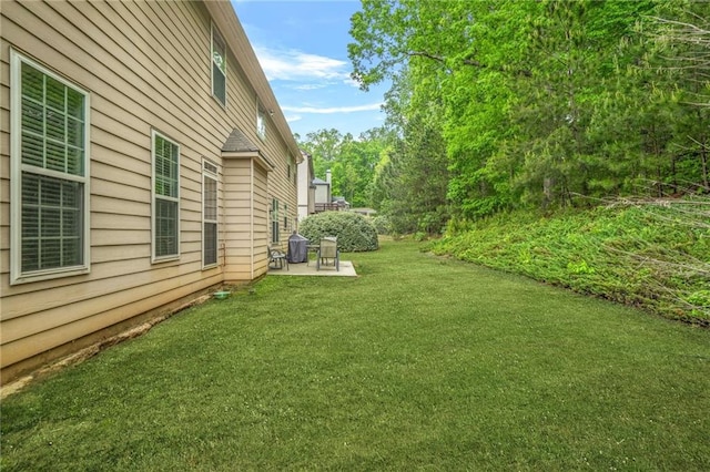 view of yard with a patio area
