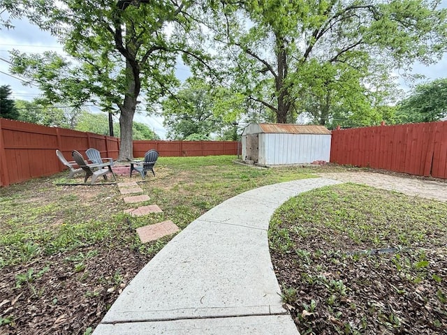 1074 Hobson St SW, Atlanta, GA 30310 - view of yard with a fire pit, a storage shed, and an outdoor structure