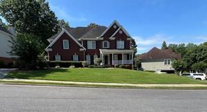 3305 Millwater Xing, Dacula, GA 30019 - view of front facade featuring a front lawn