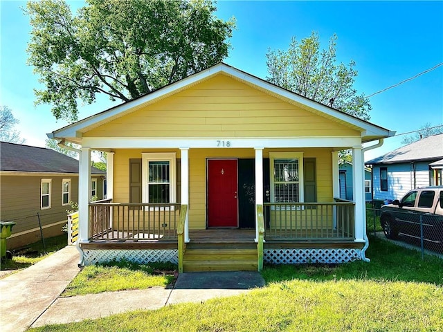 718 Dalvigney St NW, Atlanta, GA 30318 - bungalow-style house featuring a porch