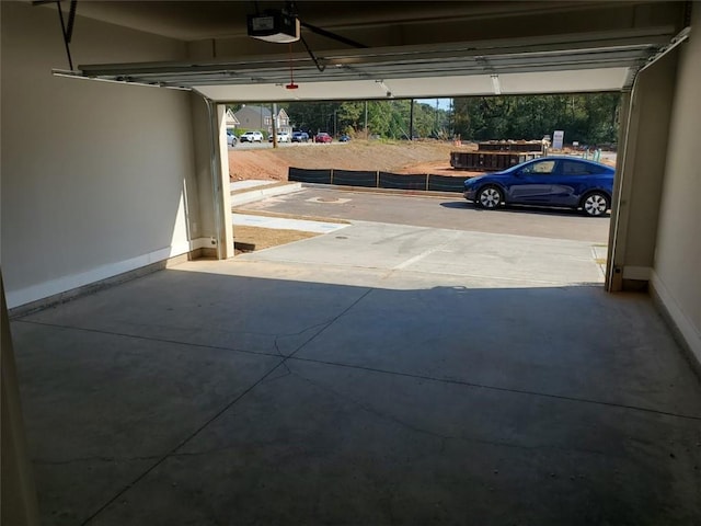 181 Dewy Rd Unit 70, Lilburn, GA 30047 - garage featuring a garage door opener