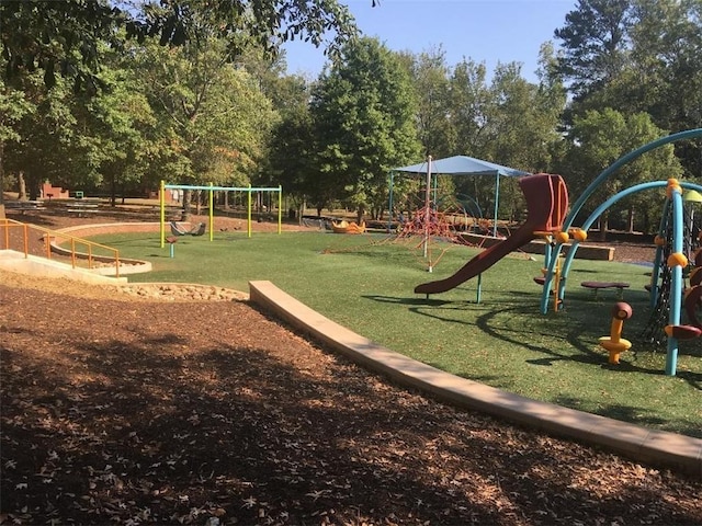 181 Dewy Rd Unit 70, Lilburn, GA 30047 - communal playground with a lawn