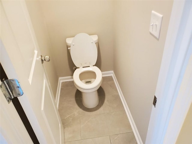 181 Dewy Rd Unit 70, Lilburn, GA 30047 - bathroom with toilet, tile patterned flooring, and baseboards