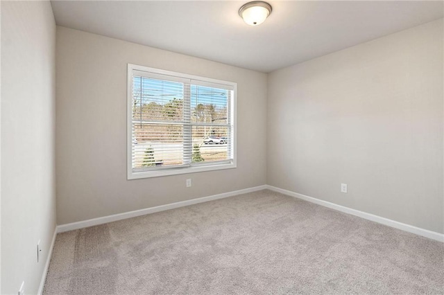 181 Dewy Rd Unit 70, Lilburn, GA 30047 - spare room featuring carpet and baseboards