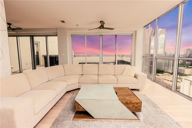 1280 W Peachtree St NW Unit 4003, Atlanta, GA 30309 - living area with ceiling fan, expansive windows, wood finished floors, and a view of city