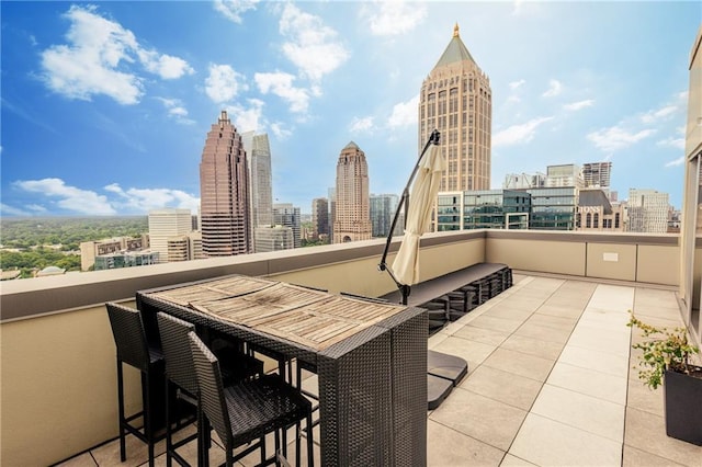 1280 W Peachtree St NW Unit 4003, Atlanta, GA 30309 - patio / terrace with a skyline view