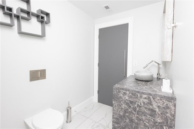 1280 W Peachtree St NW Unit 4003, Atlanta, GA 30309 - bathroom with marble finish floors and vanity