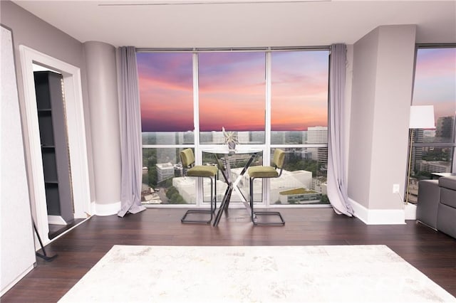 1280 W Peachtree St NW Unit 4003, Atlanta, GA 30309 - dining room featuring wood finished floors and a wall of windows
