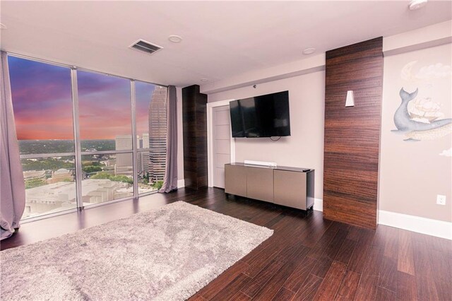 1280 W Peachtree St NW Unit 4003, Atlanta, GA 30309 - bedroom with a wall of windows and wood finished floors