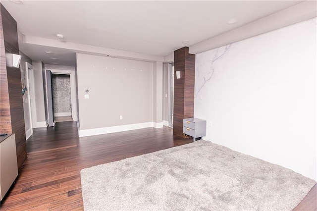 1280 W Peachtree St NW Unit 4003, Atlanta, GA 30309 - spare room featuring wood finished floors and a smoke detector