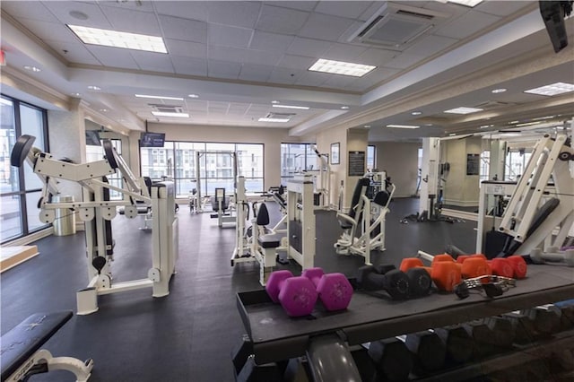 1280 W Peachtree St NW Unit 4003, Atlanta, GA 30309 - exercise room with healthy amount of natural light and a drop ceiling