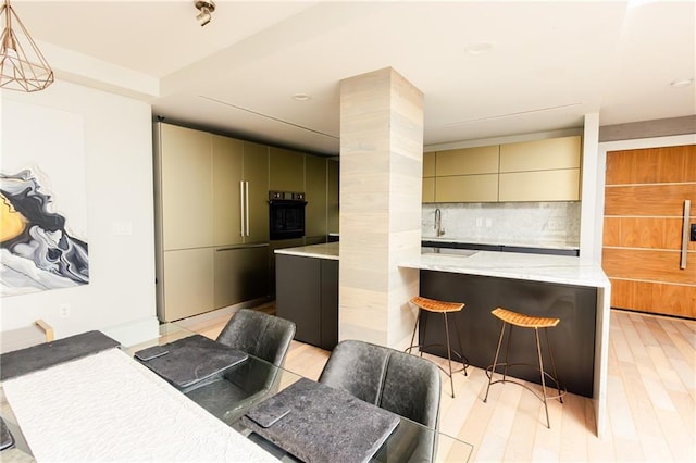 1280 W Peachtree St NW Unit 4003, Atlanta, GA 30309 - dining space with light wood-style floors