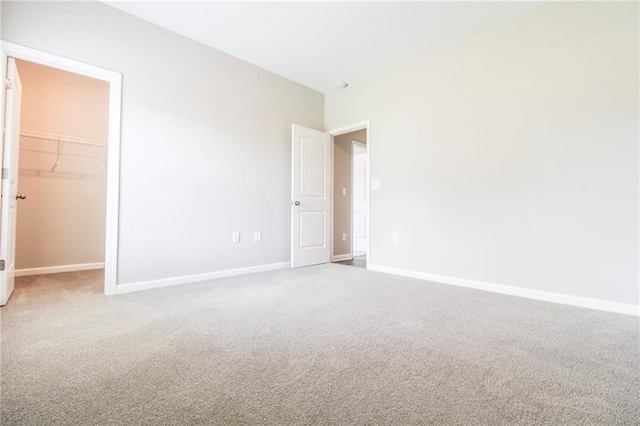 409 Glenn Trl, Winder, GA 30680 - carpeted spare room with baseboards