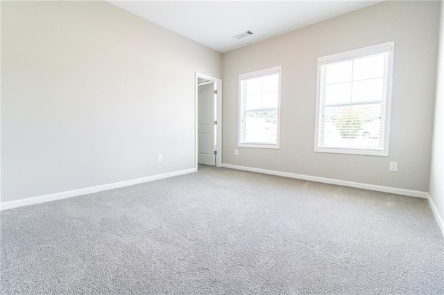 409 Glenn Trl, Winder, GA 30680 - carpeted empty room with baseboards