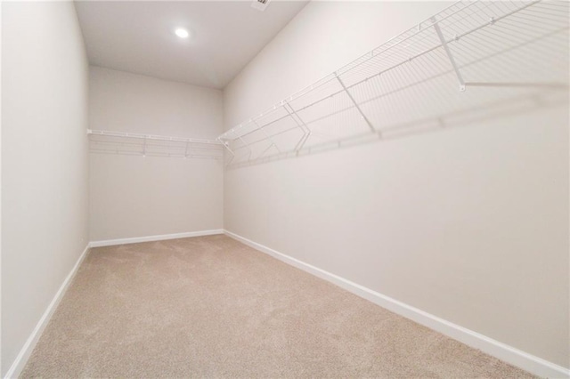 409 Glenn Trl, Winder, GA 30680 - walk in closet with carpet floors