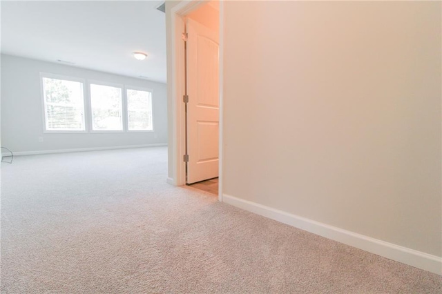 409 Glenn Trl, Winder, GA 30680 - unfurnished room featuring light colored carpet and baseboards