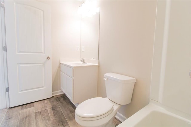 409 Glenn Trl, Winder, GA 30680 - bathroom with vanity and wood finished floors