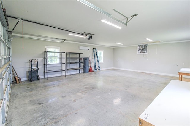 409 Glenn Trl, Winder, GA 30680 - garage with an AC wall unit and a garage door opener