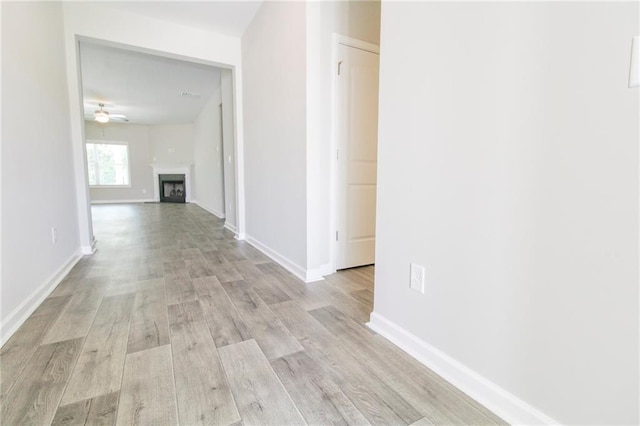 409 Glenn Trl, Winder, GA 30680 - hallway with light wood-style flooring and baseboards