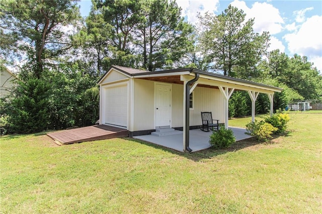 409 Glenn Trl, Winder, GA 30680 - view of outdoor structure featuring a garage