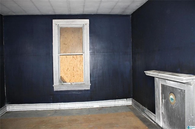 124 61st St S, Birmingham, AL 35212 - empty room with wood finished floors and baseboards