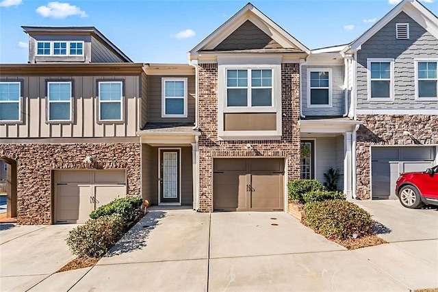 2309 Rolling Trl, Lithonia, GA 30058 - townhome / multi-family property featuring an attached garage and driveway
