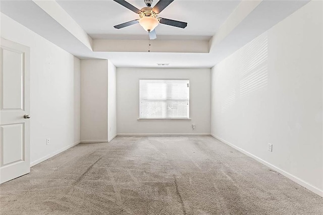 2309 Rolling Trl, Lithonia, GA 30058 - carpeted empty room featuring a raised ceiling, a ceiling fan, and baseboards