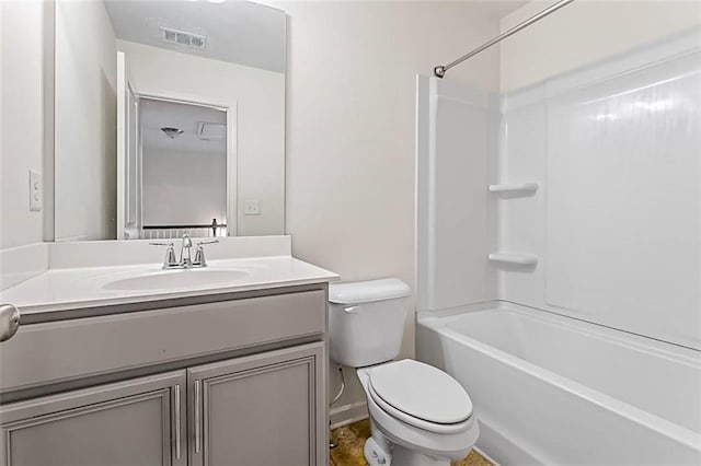 2309 Rolling Trl, Lithonia, GA 30058 - bathroom featuring toilet, vanity, and shower / tub combination