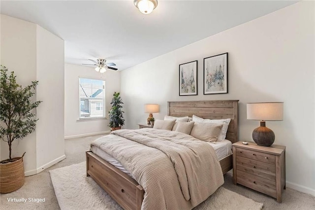 2309 Rolling Trl, Lithonia, GA 30058 - bedroom featuring light carpet, baseboards, and ceiling fan