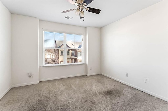 2309 Rolling Trl, Lithonia, GA 30058 - carpeted empty room with a ceiling fan and baseboards