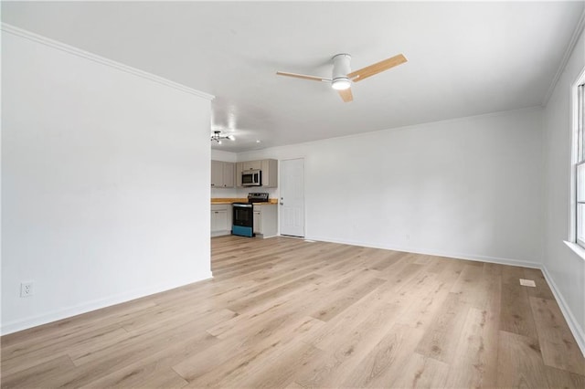 unfurnished living room featuring crown molding, ceiling fan, and light wood-type flooring