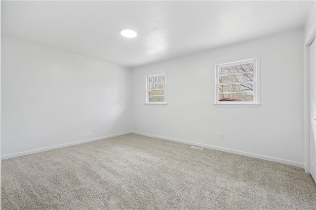 view of carpeted spare room