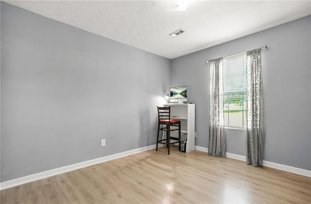 30 Creek Bottom Dr, Covington, GA 30014 - bedroom with wood finished floors and baseboards