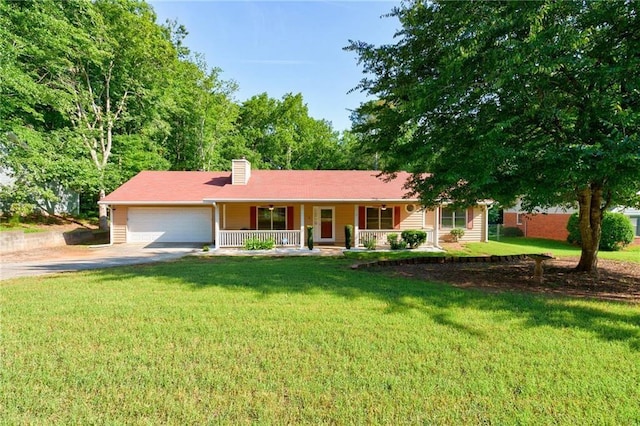 single story home with a porch, a garage, driveway, a chimney, and a front lawn