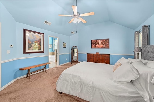 bedroom featuring visible vents, baseboards, light colored carpet, and vaulted ceiling