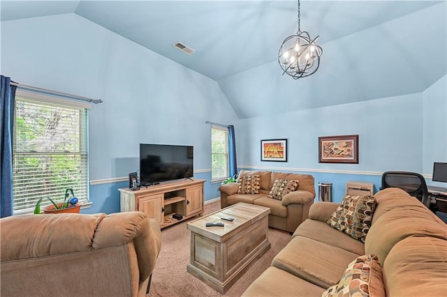 living area with a chandelier, visible vents, high vaulted ceiling, and carpet