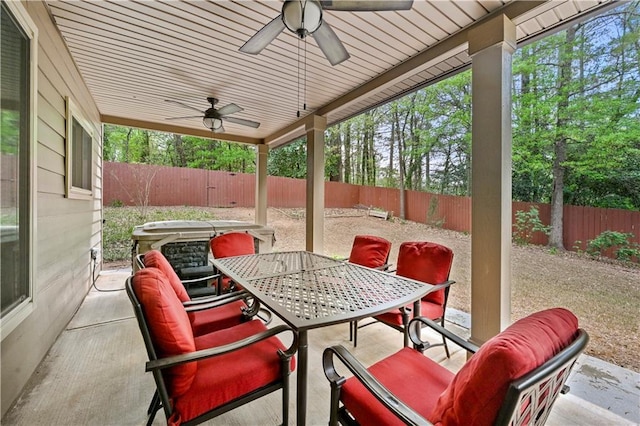 view of patio / terrace featuring outdoor dining space, ceiling fan, and a fenced backyard