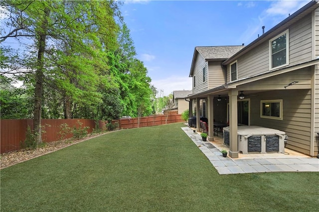 view of yard featuring a patio area and a fenced backyard
