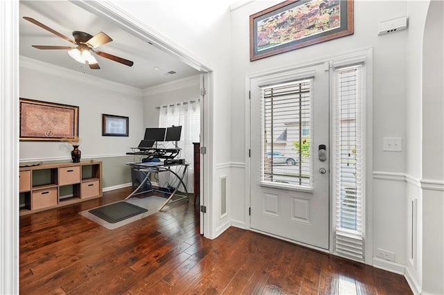 entrance foyer featuring crown molding, ceiling fan, a wealth of natural light, and hardwood / wood-style flooring