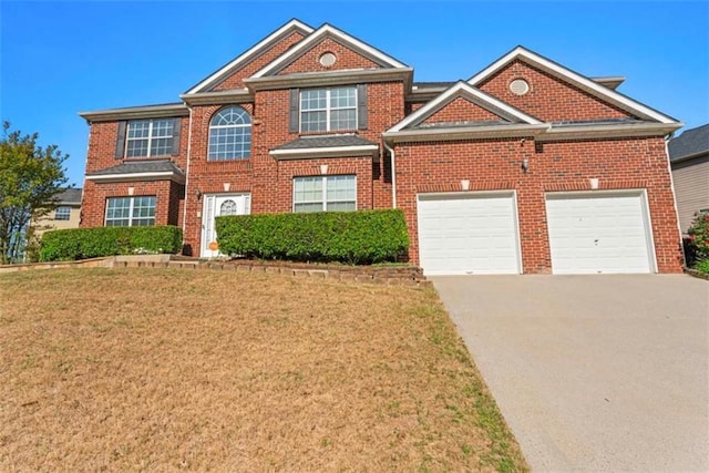 view of front of home featuring brick siding, a front lawn, driveway, and a garage