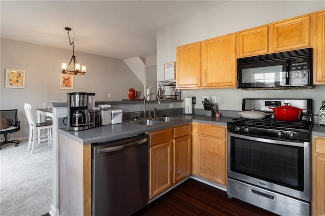 6004 Turfway Park Ct, Sugar Hill, GA 30518 - kitchen featuring appliances with stainless steel finishes, a sink, a peninsula, a chandelier, and decorative light fixtures