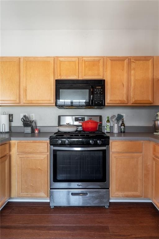 6004 Turfway Park Ct, Sugar Hill, GA 30518 - kitchen featuring black microwave, stainless steel gas range, dark wood-style flooring, and dark countertops