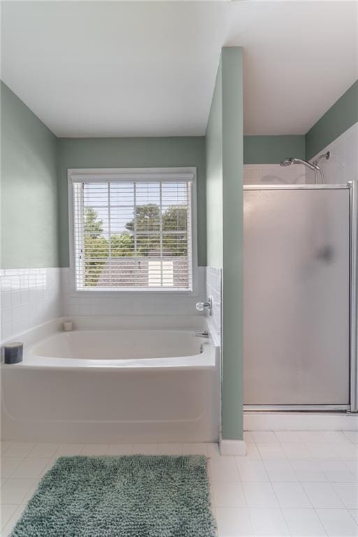 6004 Turfway Park Ct, Sugar Hill, GA 30518 - full bathroom with a shower stall, a garden tub, and tile patterned floors