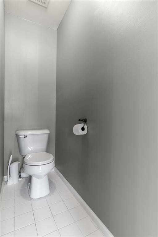 6004 Turfway Park Ct, Sugar Hill, GA 30518 - bathroom with toilet, tile patterned floors, and baseboards