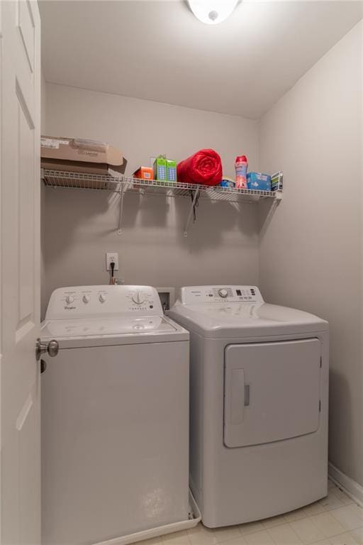 6004 Turfway Park Ct, Sugar Hill, GA 30518 - washroom with washer and dryer and baseboards