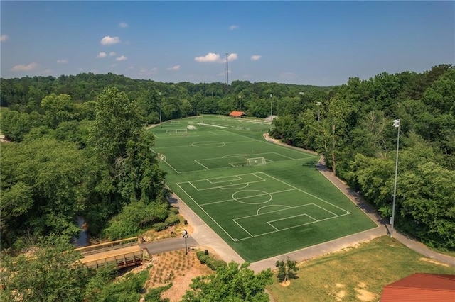6004 Turfway Park Ct, Sugar Hill, GA 30518 - view of sport court featuring a forest view and a sport area