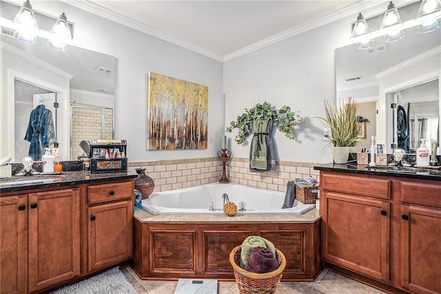 bathroom featuring tile patterned floors, vanity, separate shower and tub, and crown molding