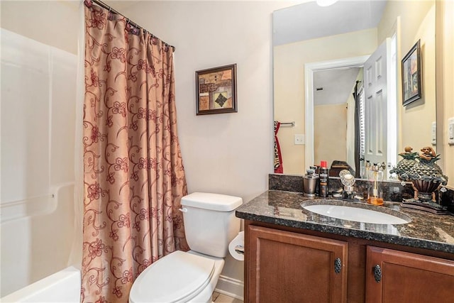 full bathroom with vanity, toilet, and shower / bath combo with shower curtain