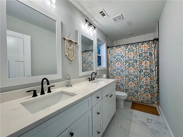 bathroom featuring a shower with shower curtain, vanity, and toilet