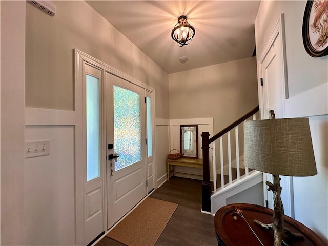 entrance foyer with dark hardwood / wood-style flooring